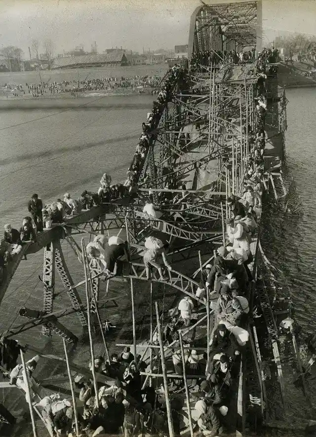 Flight Of Refugees Across Wrecked Bridge In Korea, 1951