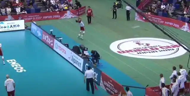 #9. Volleyball Player Jumps Fence And Scores