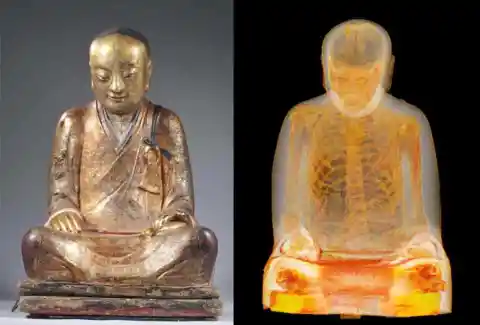 #2. A Monk Inside A Buddha Sculpture