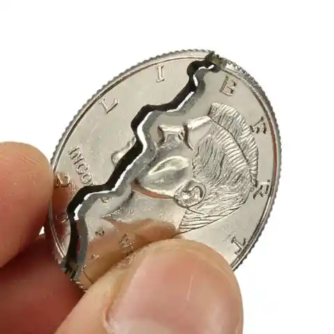#13. Biting A Coin In Half