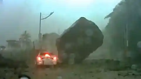 #5. Car Nearly Crushed By Boulder